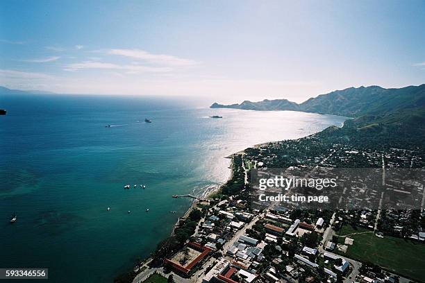 Aerial view of Dili Coastline and residential areas. Civil Conflict escalates in East Timor - Dili June 2nd - 6th 2006