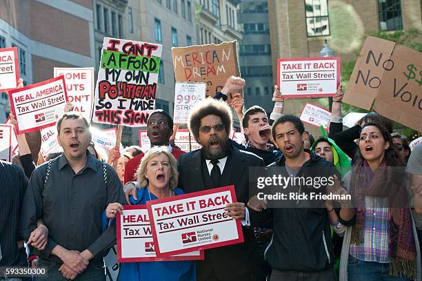 Professor Cornell West of Princeton University marches with the Occupy Boston protest in downtown Boston on October 5, 2011