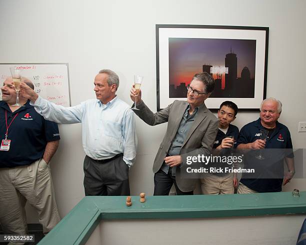 John Henry, principal owner of the Red Sox with co-owner Larry Lucchino toasting their employees in the ticket office for their 8th straight sold out...