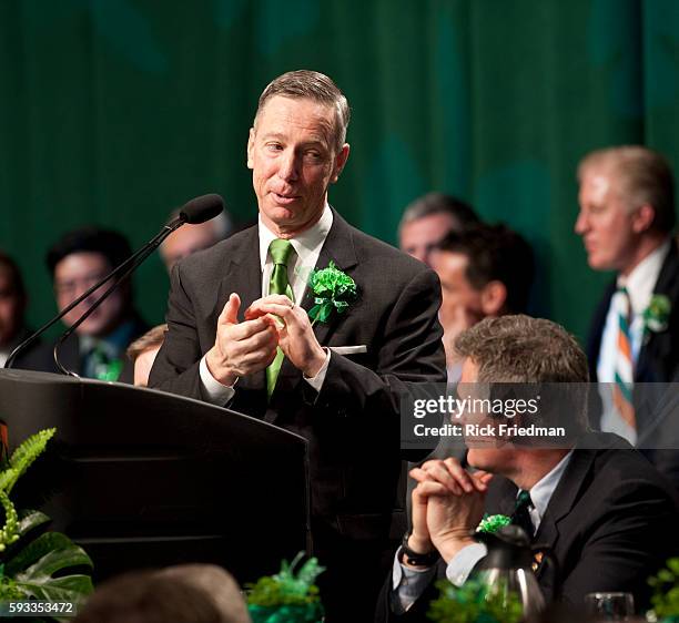 Senator Scott Brown, listens as Congressman Stephen Lynch of South Boston speaking at the St. Patrick's Day political roast in Boston, MA. On March...