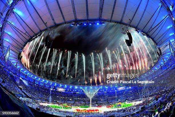 Fireworks explode above the Maracana Stadium at the end of the closing ceremony of the Rio 2016 Olympic games on August 21, 2016 in Rio de Janeiro,...