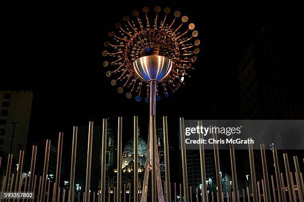 The Olympic flame is seen extinguished in front of the candelaria church on the Olympic Boulevard while the Rio 2016 closing ceremony takes place at...