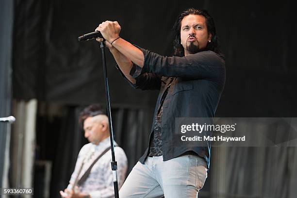 Leigh Kakaty of Pop Evil performs on stage during the Pain In The Grass music festival hosted by 99.8 KISW at White River Amphitheatre on August 21,...