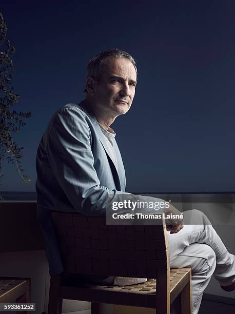 Director Olivier Assayas is photographed for Self Assignment on May 17, 2014 in Cannes, France.