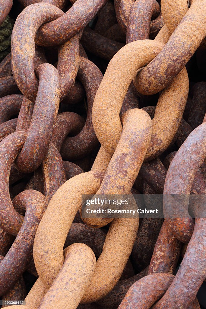 Rusty chains used in whaling industry in closeup