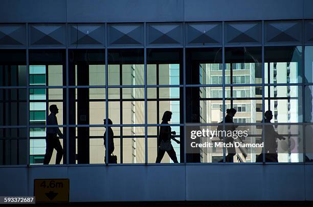 downtown calgary overpass with pedestrians - calgary ストックフォトと画像