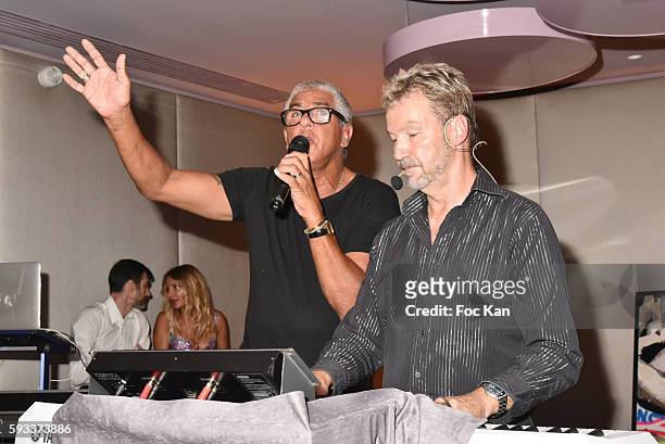 SamyÊNaceri and a singer attend the Massimo Gargia Birthday Party at Hotel de Paris of Saint Tropez on August 21, 2016 in Saint-Tropez, France.