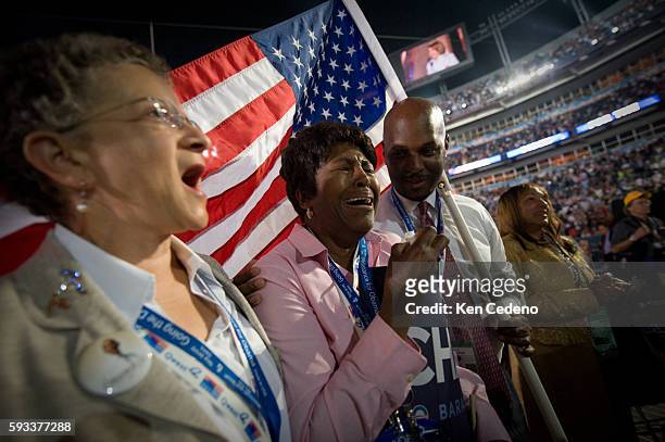 Supporter Elease Evans is overcome with emotion as she listens to Speaker fo the House Nancy Pelosi speak on the final night of the Democratic...