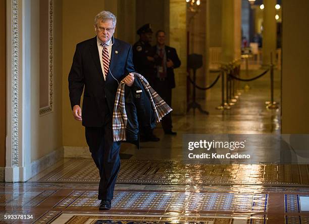 Congressman Alan Nunelee, , walks on Capitol Hill December 31, 2012 in Washington D.C., while Congressional Leaders try to work out a deal to prevent...