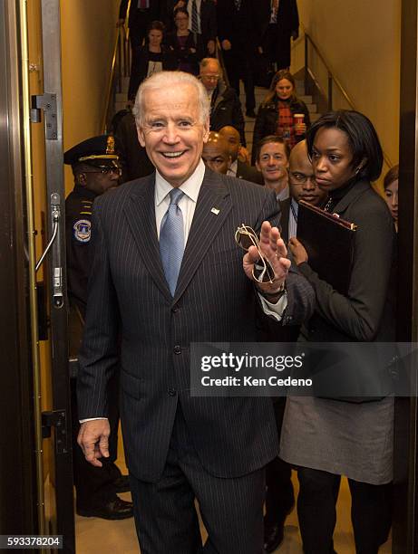 Vice President Joe Biden, arrives for a House Democratic Caucus meeting for an unusual New Year's Day session to discuss legislation that will curb...