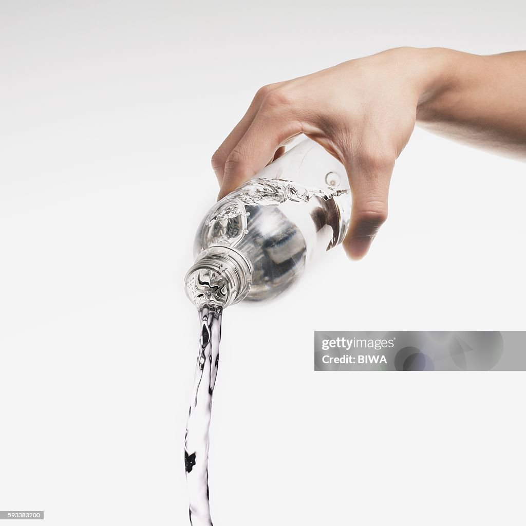 Water Pouring Out of Plastic Bottle