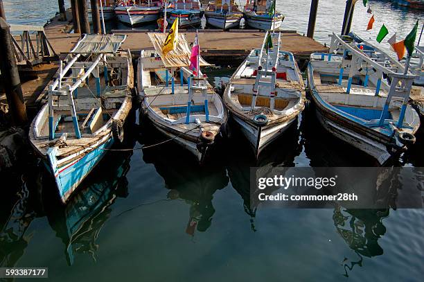 boats at fish harbour, kemari , karachi. - arabian sea stock pictures, royalty-free photos & images