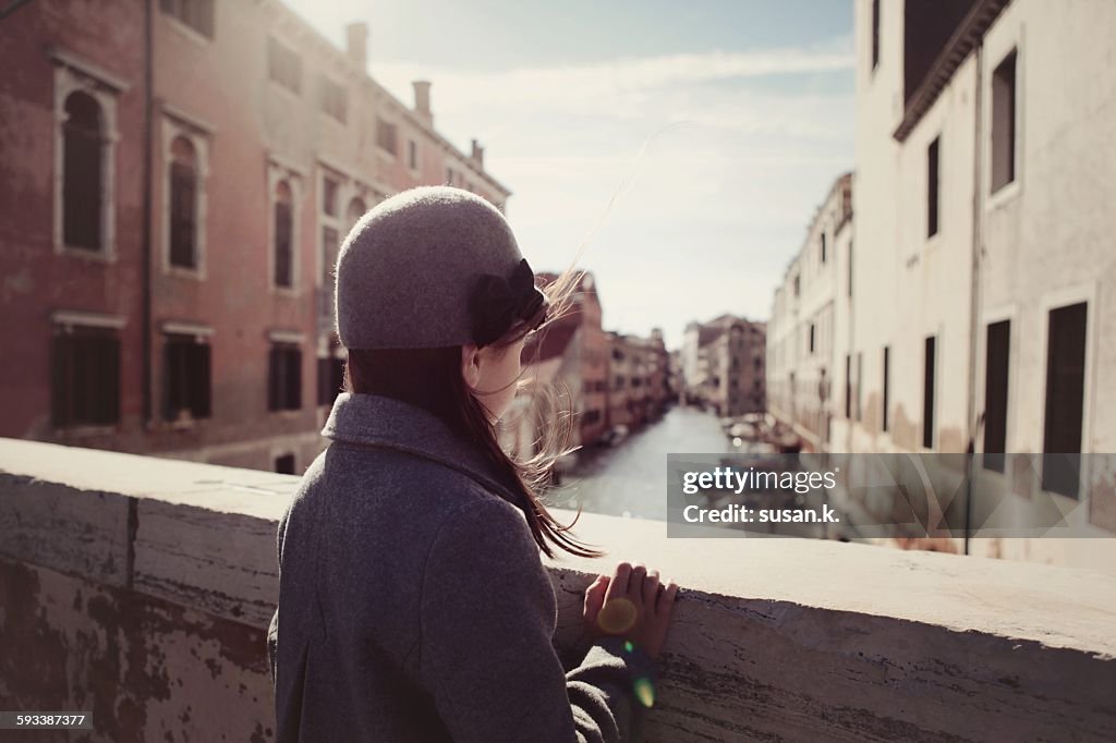 Girl admiring venetian alley