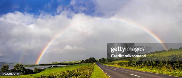 hq and resolution double rainbow landscape in beautiful  irish landscape scenery. - lumen field stockfoto's en -beelden
