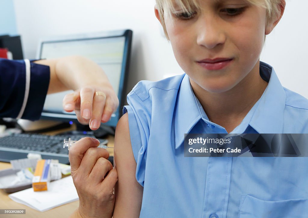 Young Boy Getting Injection High-Res Stock Photo - Getty Images