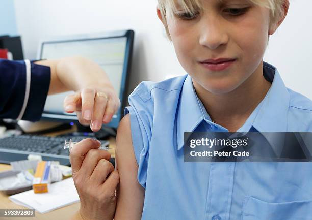 Kid Getting A Injection 784 Child Vaccination Uk Stock Photos, High-Res Pictures, and Images ...