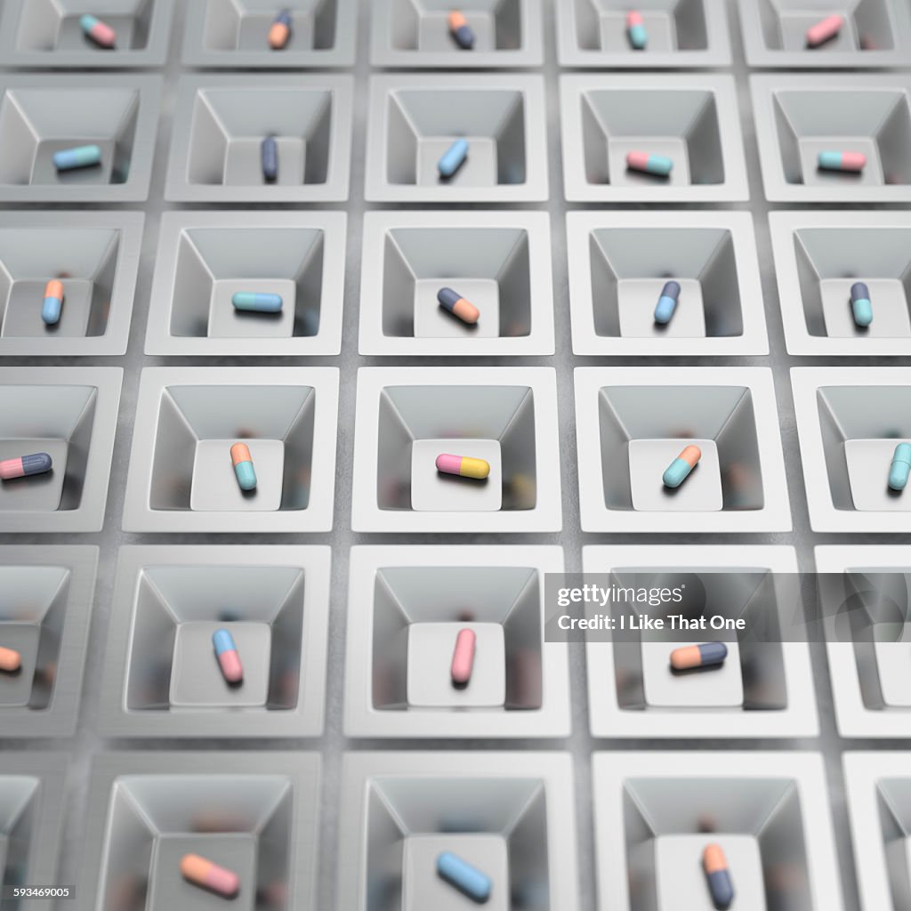 Pill / medication capsules in steel cups