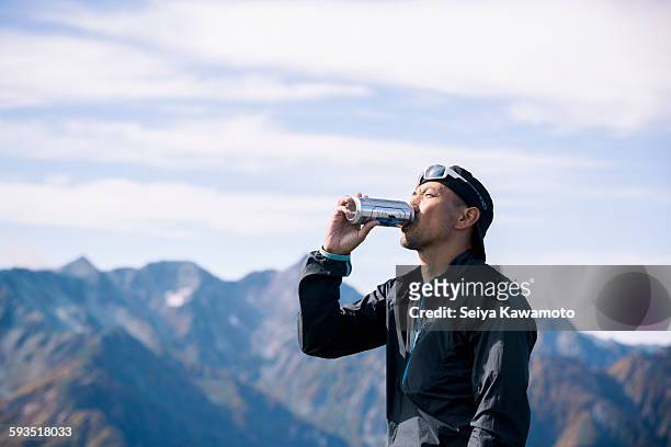 holiday climbing - drinks can stock pictures, royalty-free photos & images
