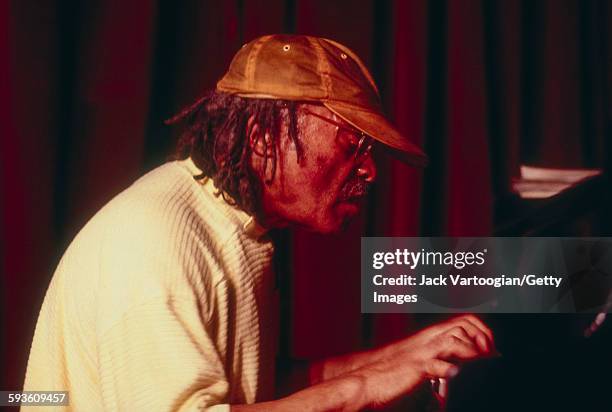 American Free Jazz musician, poet, and composer Cecil Taylor plays piano as he performs with his trio at the Village Vanguard nightclub, New York,...