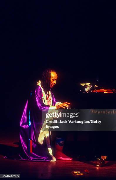 American Free Jazz musician, poet, and composer Cecil Taylor plays piano as he performs at a solo concert celebrating his 65th birthday presented by...