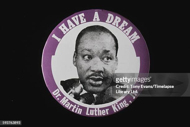 Badge featuring American civil rights activist Martin Luther King, Jr., and the quote from his famous speech 'I Have a Dream', circa 1963.