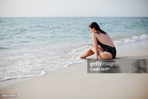 girl on beach - n n girl models stock pictures, royalty-free photos & images