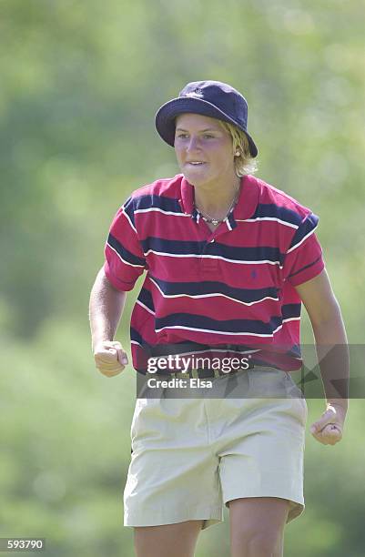 Nicole Perrot of Chile reacts after winning a hole during her final match with meredith duncan in the 2001 us women's amateur championship at flint...