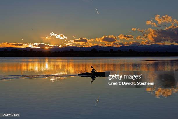 sunset kayaker - aurora colorado stock-fotos und bilder