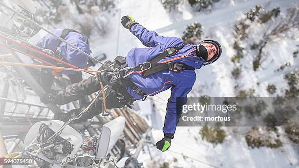 two telecommunication manual high worker engineers repairing antenna - the two towers stock pictures, royalty-free photos & images