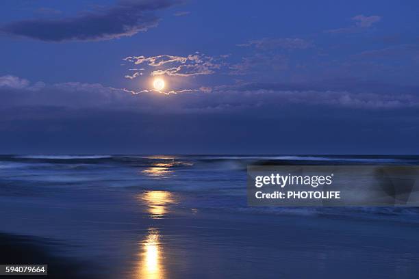 kujukuri beach and full moon, chiba prefecture, honshu, japan - moon shore stock pictures, royalty-free photos & images