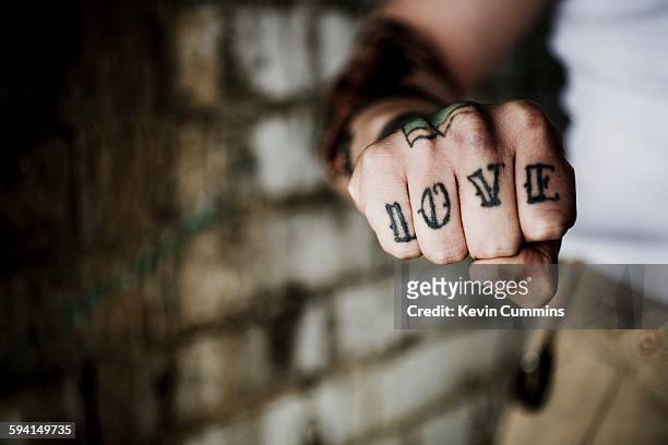 106 Knuckle Tattoo Photos and Premium High Res Pictures - Getty Images