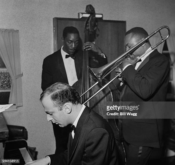American jazz musicians Sam Jones on the double bass, J. J. Johnson on the trombone and Victor Feldman on the piano, circa 1960.