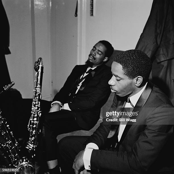 American jazz saxophonist Eric Dolphy with double bassist Reggie Workman , circa 1960.