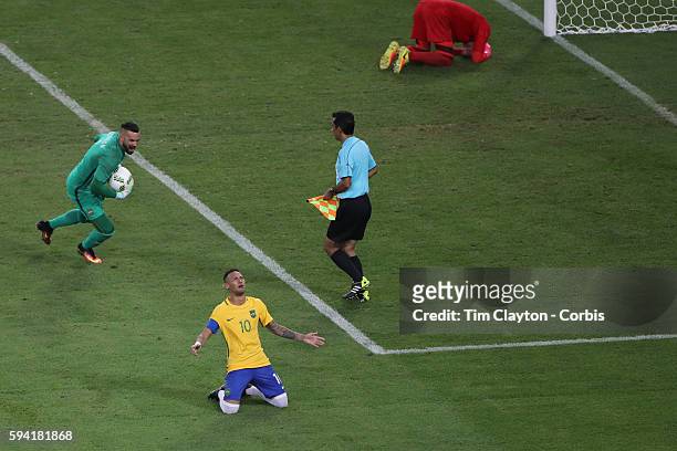 Day 15 Neymar of Brazil in tears after scoring the winning penalty kick as Goalkeeper Timo Horn of Germany lies distraught in the penalty area during...