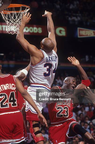 Michael Jordan of the Chicago Bulls runs on the court during a game in the 1991 Eastern Conference Semifinals against the Philadelphia 76ers in May,...