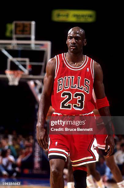 Michael Jordan of the Chicago Bulls walks on the court during a game in the 1991 Eastern Conference Semifinals against the Philadelphia 76ers in May,...