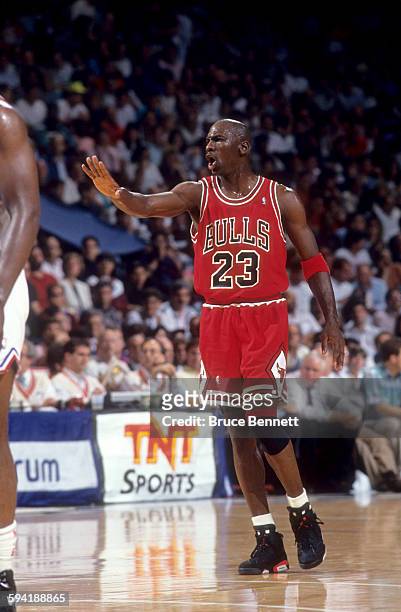 Michael Jordan of the Chicago Bulls yells out the play during a game in the 1991 Eastern Conference Semifinals against the Philadelphia 76ers in May,...
