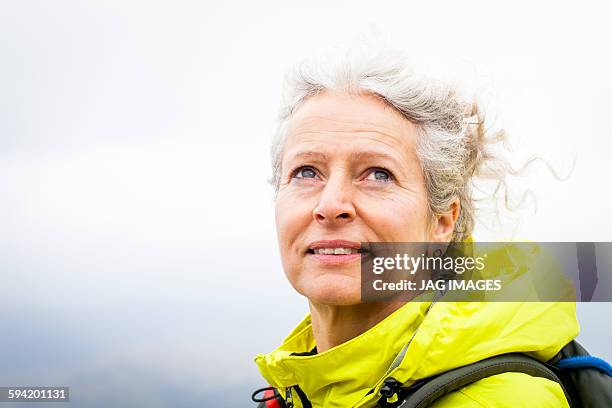 Older woman trekking in the mountains of ireland