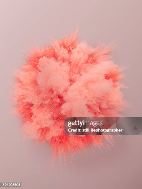 pink powder explosion - powder explosion photos et images de collection