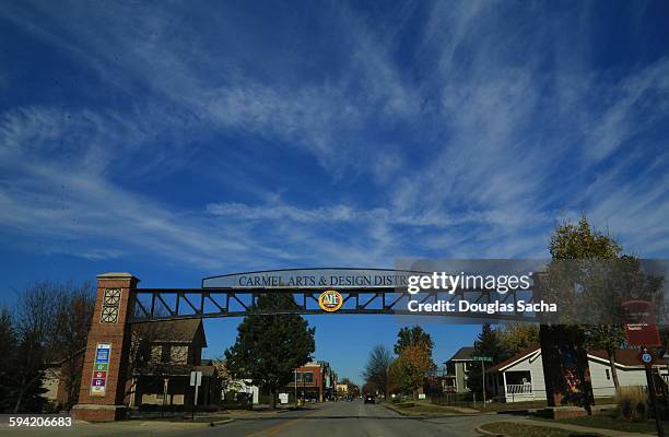 welcome sign at carmel indiana - indiana stock pictures, royalty-free photos & images