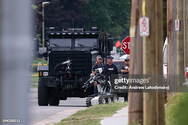Bomb squad robot makes it way back to base on Park St. In Strathroy, Ont. On August 11, 2016. Terrorism suspect Aaron Driver, who frequently used...