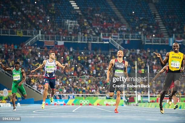 Summer Olympics: Great Britain Adam Gemili, Canada Andre De Grasse, Jamaica Usain Bolt in action, crossing finish line during the Men's 200m...