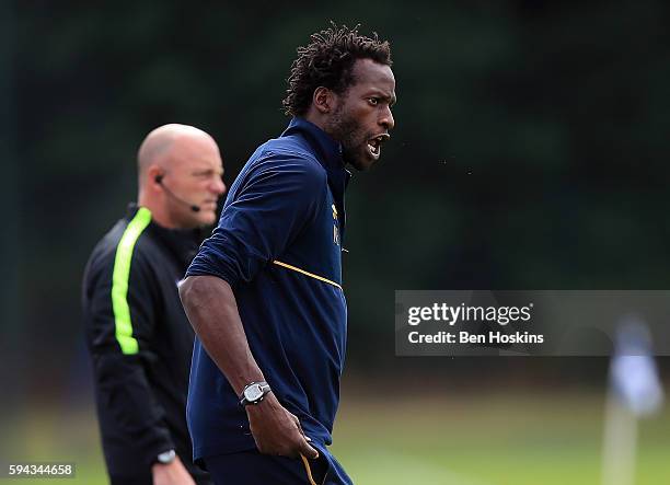 Tottenham manager Ugo Ehiogu shouts instructions during the Premier League 2 match between Reading and Tottenham Hotspur on August 22, 2016 in...