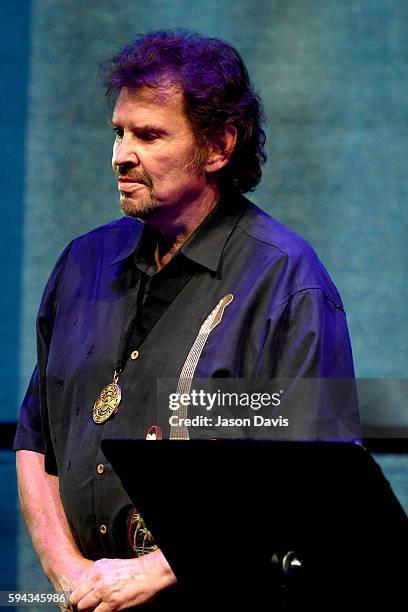 Jeff Cook of the band Alabama speaks during the debut of the "Alabama: Song of the South" exhibition at Country Music Hall of Fame and Museum on...