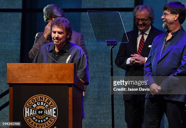 Jeff Cook of the band Alabama speaks during the debut of the "Alabama: Song of the South" exhibition at Country Music Hall of Fame and Museum on...