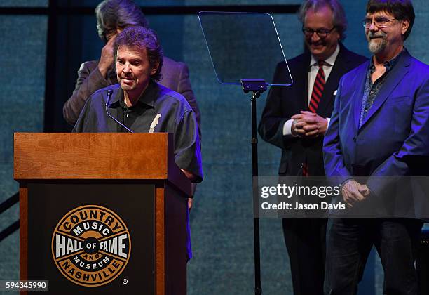 Jeff Cook of the band Alabama speaks during the debut of the "Alabama: Song of the South" exhibition at Country Music Hall of Fame and Museum on...