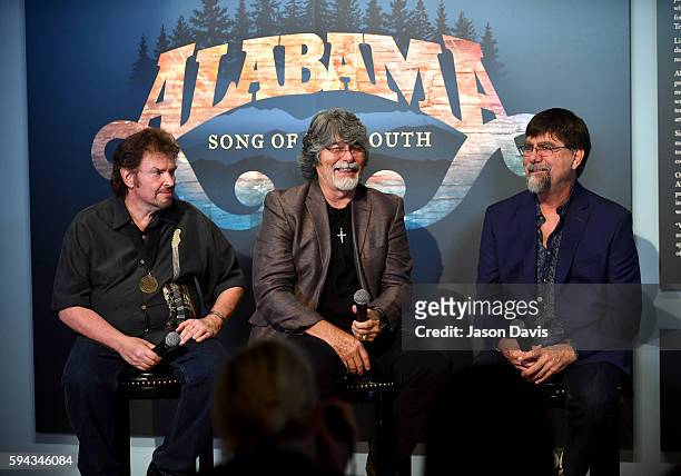 Jeff Cook, Randy Owen, and Teddy Gentry of the band Alabama speak during the debut of the "Alabama: Song of the South" exhibition at Country Music...