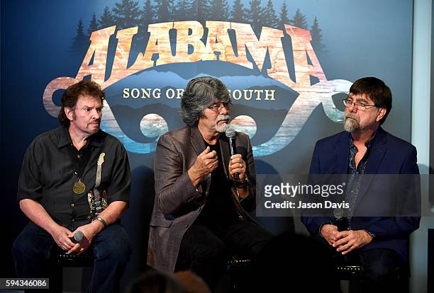 Jeff Cook, Randy Owen, and Teddy Gentry of the band Alabama speak during the debut of the "Alabama: Song of the South" exhibition at Country Music...