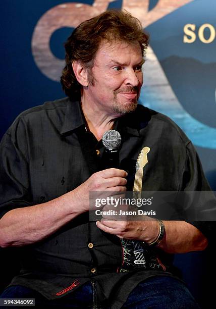 Jeff Cook of the band Alabama speaks during the debut of the "Alabama: Song of the South" exhibition at Country Music Hall of Fame and Museum on...