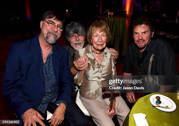 Teddy Gentry and Randy Owen of the band Alabama, Country Music Hall of Fame member Jo Walker-Meador, and Jeff Cook of the band Alabama attend the...